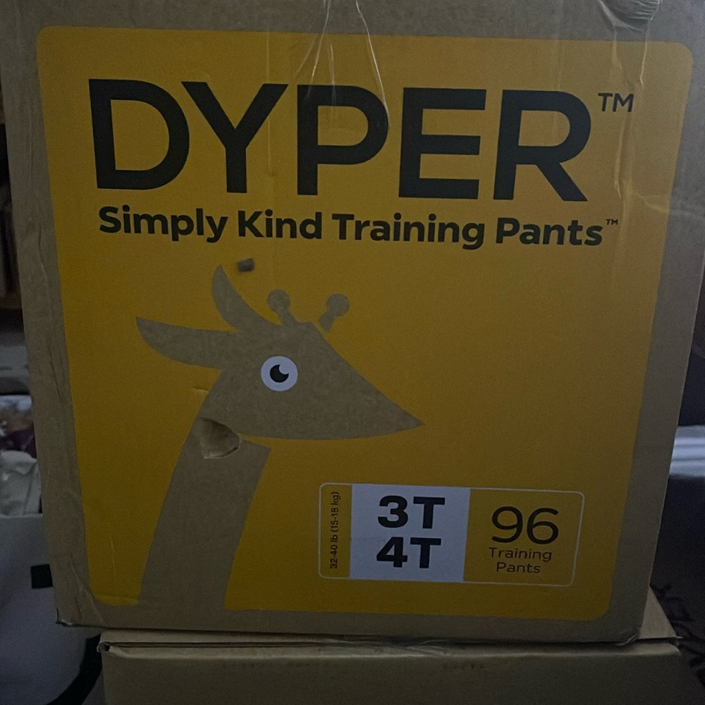 Unopened box of dyper 3T 4T simply kind training pants